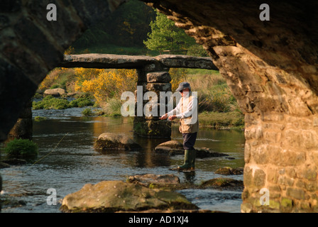 Fly fisherman on river Dart Dartmoor Devon UK Stock Photo