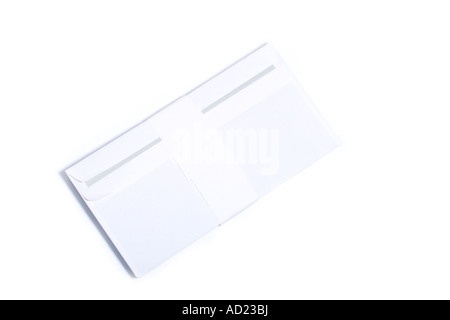 Two plain white envelopes placed diagonally, isolated on a clean white background. Stock Photo