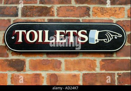 Toilets this way Stock Photo