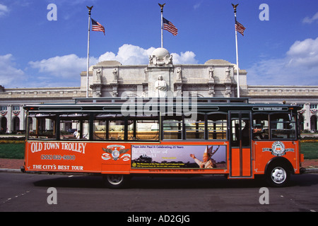 Old Town Trolley Bus driving past Union Railway Station, Washington, DC, USA Stock Photo