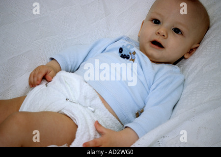 Young Baby Comfortable In Reusable Nappy Stock Photo