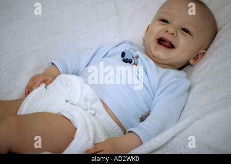 Happy Baby In Terry Nappies Stock Photo