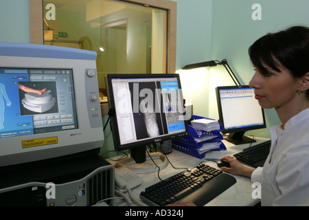 female doctor in X-ray control room at hospital Stock Photo