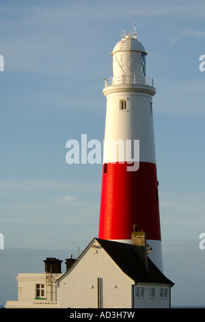 Portland Bill lighthouse and keepers cottages in early morning light Stock Photo