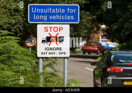 Villagers place an 'ignore Sat Nav' sign to warn lorry drivers of unsuitable route for long vehicles. Picture by Jim Holden. Stock Photo