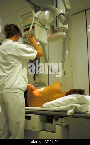 Making an xray of a woman s back Stock Photo
