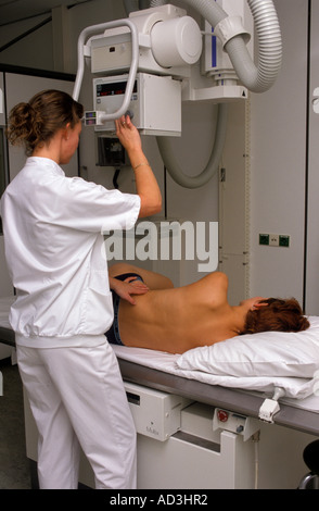 Making an xray of a woman s back Stock Photo