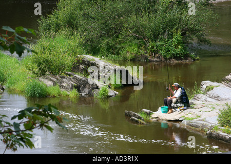 Fishing in the River Teifi at Cenarth, Carmarthenshire, South Wales Stock Photo