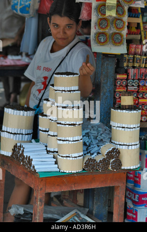 Young woman selling tobacco in a street market Peru South America Stock Photo