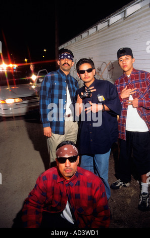Hispanic gang members showing gang signs in Caldwell Idaho Photo illustration  Stock Photo