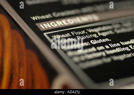 Macro photograph of the ingredients on food packaging.  contains wheat flour. Stock Photo