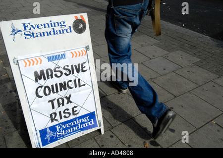 Headline on Evening Standard newspaper hoarding Massive Council Tax Rise London England UK Stock Photo