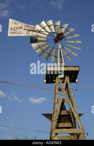 an old style windmill built by the Aermotor company of Chicago Stock Photo