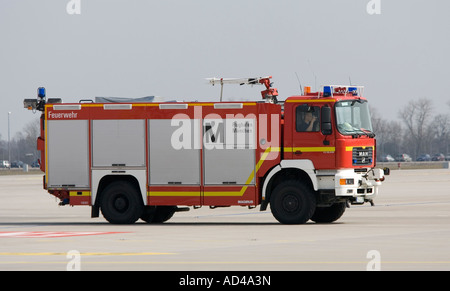 Fire engine typed MAN 19.410 of Munich Airport Fire Brigade on Munich airport, Bavaria, Germany Stock Photo
