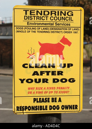 Harwich Tendring District Council notice fixed to lamp post warning dog owners not to permit dogs to foul the footpath Stock Photo