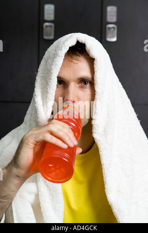 Close up of a man resting in a locker room Stock Photo