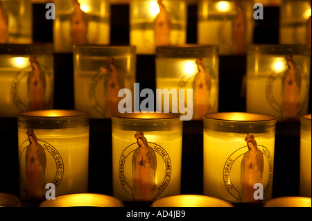 Candles lit as a prayer Notre dame cathedral paris france Stock Photo