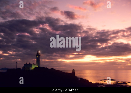 Turnberry Lighthouse illuminated at sunset Ayrshire Coast Scotland UK Stock Photo