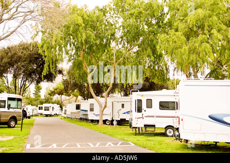RV trailers parked in campground Stock Photo