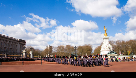 The Coldstream Guards Regiment with regimental band playing music Changing of The Guard ceremony at Buckingham Palace London Stock Photo