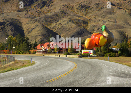 Road and Big Fruit Cromwell Central Otago South Island New Zealand Stock Photo