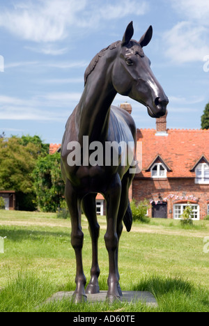 Bronze statue of ten year old racehorse Best Mate winner of three Gold Cups at the Cheltenham Races National Stock Photo