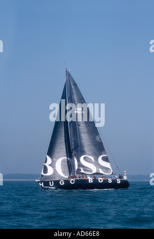 The Farr 65 design yacht Hugo Boss racing off the Isle of Wight Hampshire England during Cowes Week Stock Photo