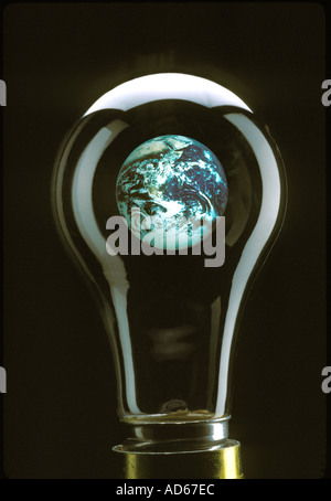 Earth in light bulb Stock Photo