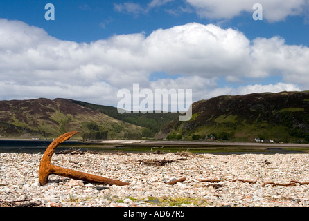 Rusted ships anchor on Glenelg beach with the isle of Skye in the background. Glenelg, Highlands, Western Scotland Stock Photo