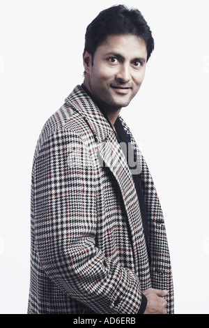 Side profile of a mid adult man smiling Stock Photo - Alamy
