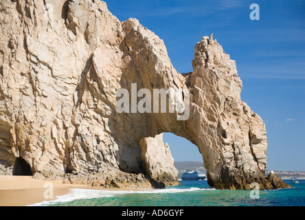 Passenger cruise liner viewed through natural sea arch at Baja Peninsula at Cabo San Lucas Baja California Mexico North America Stock Photo