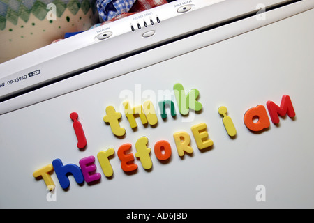 Descartes famous quote I think therefore I am written in fridge magnets on a refrigerator door Stock Photo