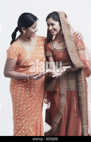 Mother and her daughter looking at each other Stock Photo