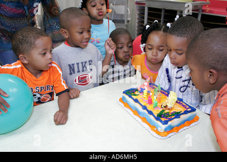 Portsmouth Virginia,High Street,Children's Museum of Virginia,Black boy boys male kids children birthday party,cake,candles,blowing,VA060513045 Stock Photo