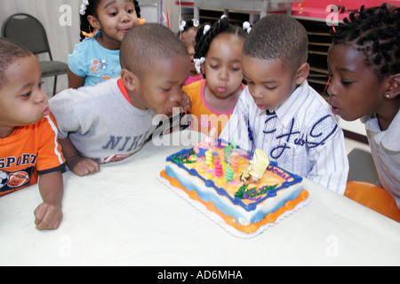 Portsmouth Virginia,High Street,Children's Museum of Virginia,Black boy boys male kids children birthday party,cake,candles,blowing,VA060513046 Stock Photo