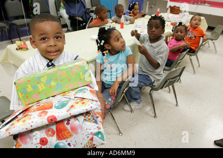 Portsmouth Virginia,High Street,Children's Museum of Virginia,Black boy boys male kids children birthday party,presents,VA060513057 Stock Photo