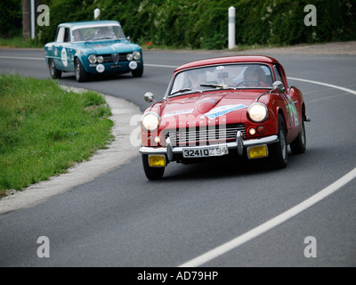 Triumph GT6 and Alfa Romeo Giulia in the Boucles de Loire classic car rallye july 2007 Loire Valley France Stock Photo