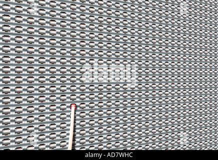 Concept image of small phonejack in massive wall of phone plugs Stock Photo