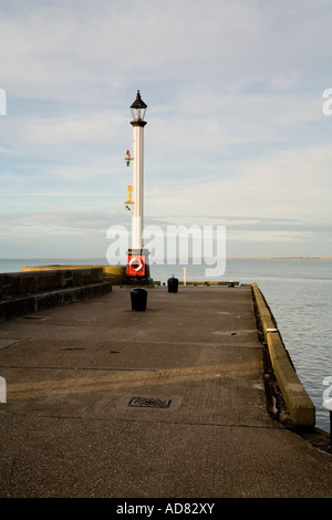 Harbour entrance light on the harbour wall at Bridlington Yorkshire coast Stock Photo