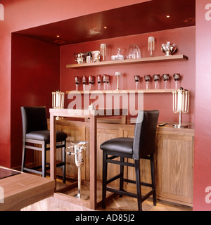 Contemporary bar and leather stools in kitchen alcove Stock Photo