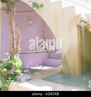 Outdoor lounge with water feature Stock Photo