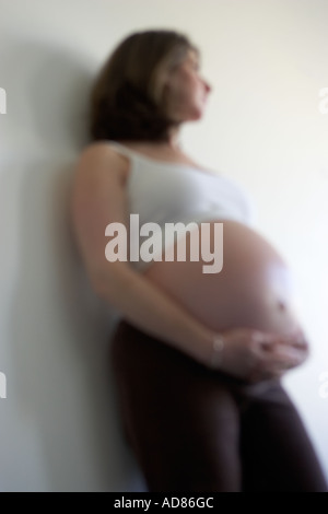 Pregnant Woman Meditating Stock Photo