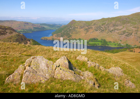 View over Ullswater Lake District UK with a rock in the foreground Stock Photo