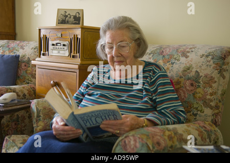 Elderly lady reading Stock Photo