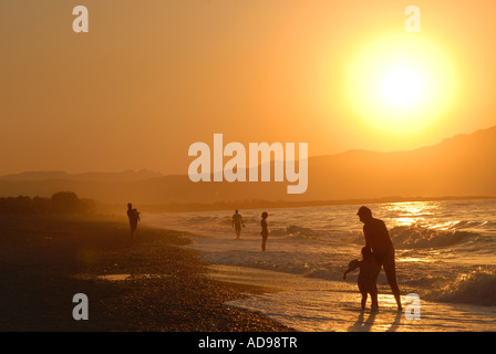 CRETE, GREECE. View of a sunset over the Rodhopou Peninsula as seen from the beach between Maleme and Gerani near Hania. Stock Photo