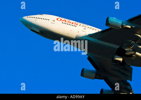 Hong Kong Oasis Airlines 747 Passenger Jet in the Air Just after Takeoff Stock Photo