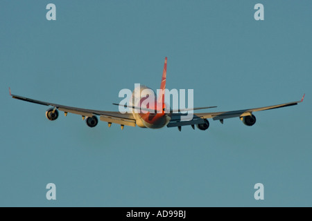Tail View of Hong Kong Oasis 747 Airlines Passenger Jet in the Air Just after Takeoff Stock Photo