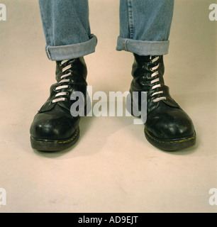 feet in combat boots sign for right wing radicalism Stock Photo