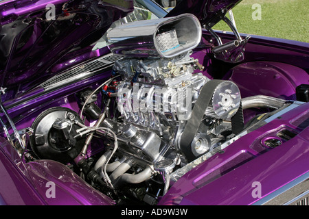 Blown supercharged Australian Holden V8 engine sitting in the bay of an iconic Aussie 1970s muscle car Stock Photo