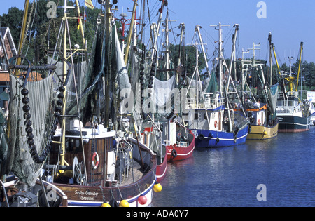 fishing cutters and crab cutters in the harbour of Greetsiel, Germany, Lower Saxony, Greetsiel Stock Photo